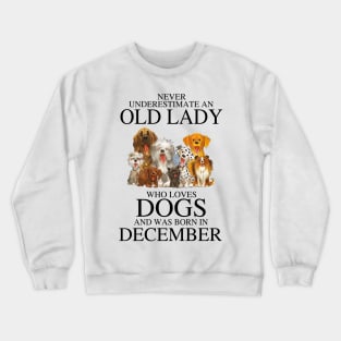 Never Underestimate An Old Lady Who Loves Dogs And Was Born In December Crewneck Sweatshirt